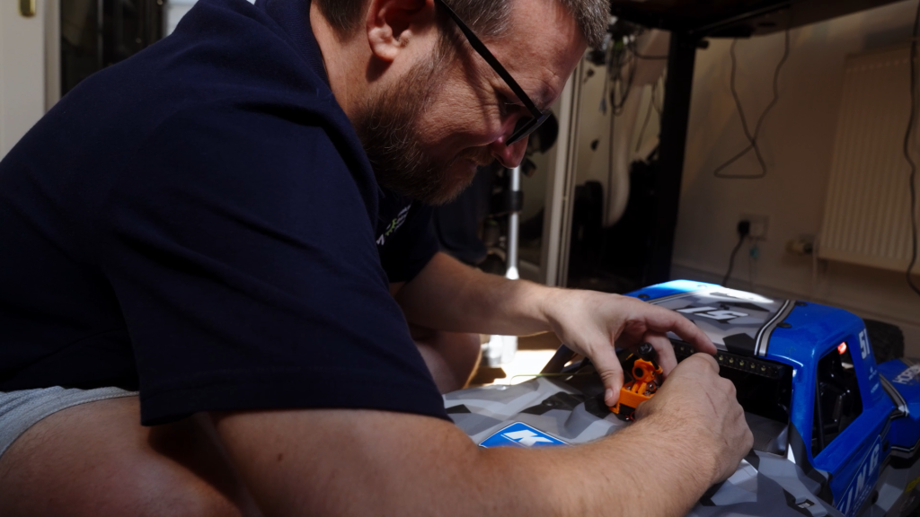 Martyn working on a remote controlled car for a client